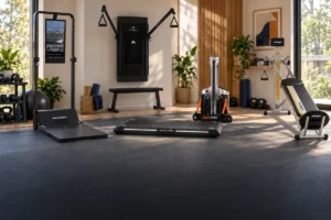 Five compact home gym systems arranged in a small modern workout room