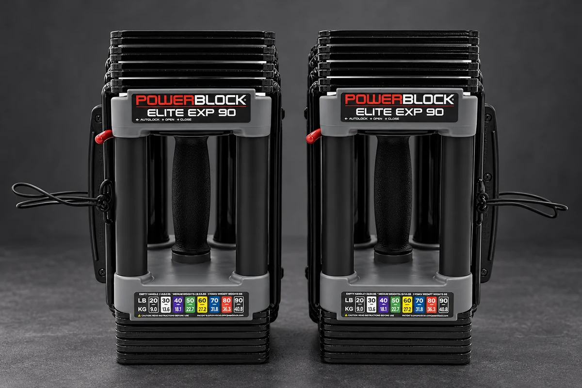 PowerBlock Elite EXP Stage 1 adjustable dumbbell pair with selector pins and color-coded rails